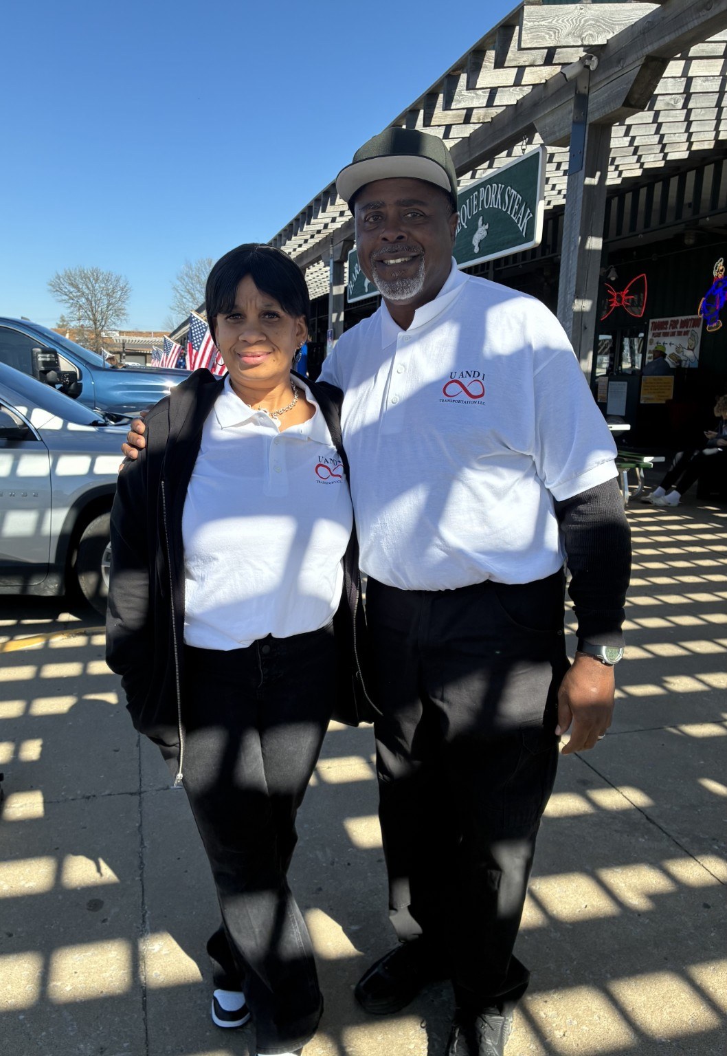 U AND I Transportation team members wearing branded shirts